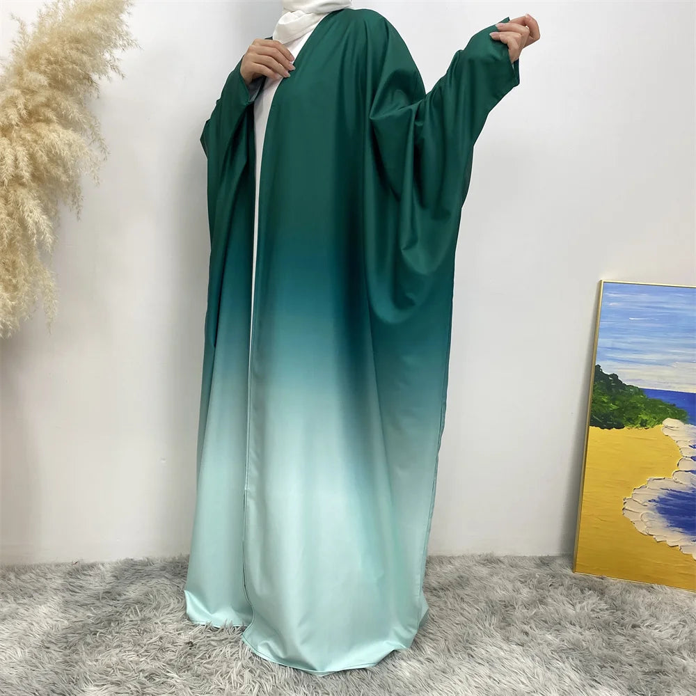 Middle East Muslim fashion new hot Dubai cardigan robe Arab Turkey long-sleeved gradual change dress dress Islamic women loose