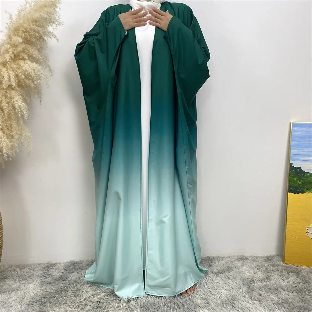 Middle East Muslim fashion new hot Dubai cardigan robe Arab Turkey long-sleeved gradual change dress dress Islamic women loose